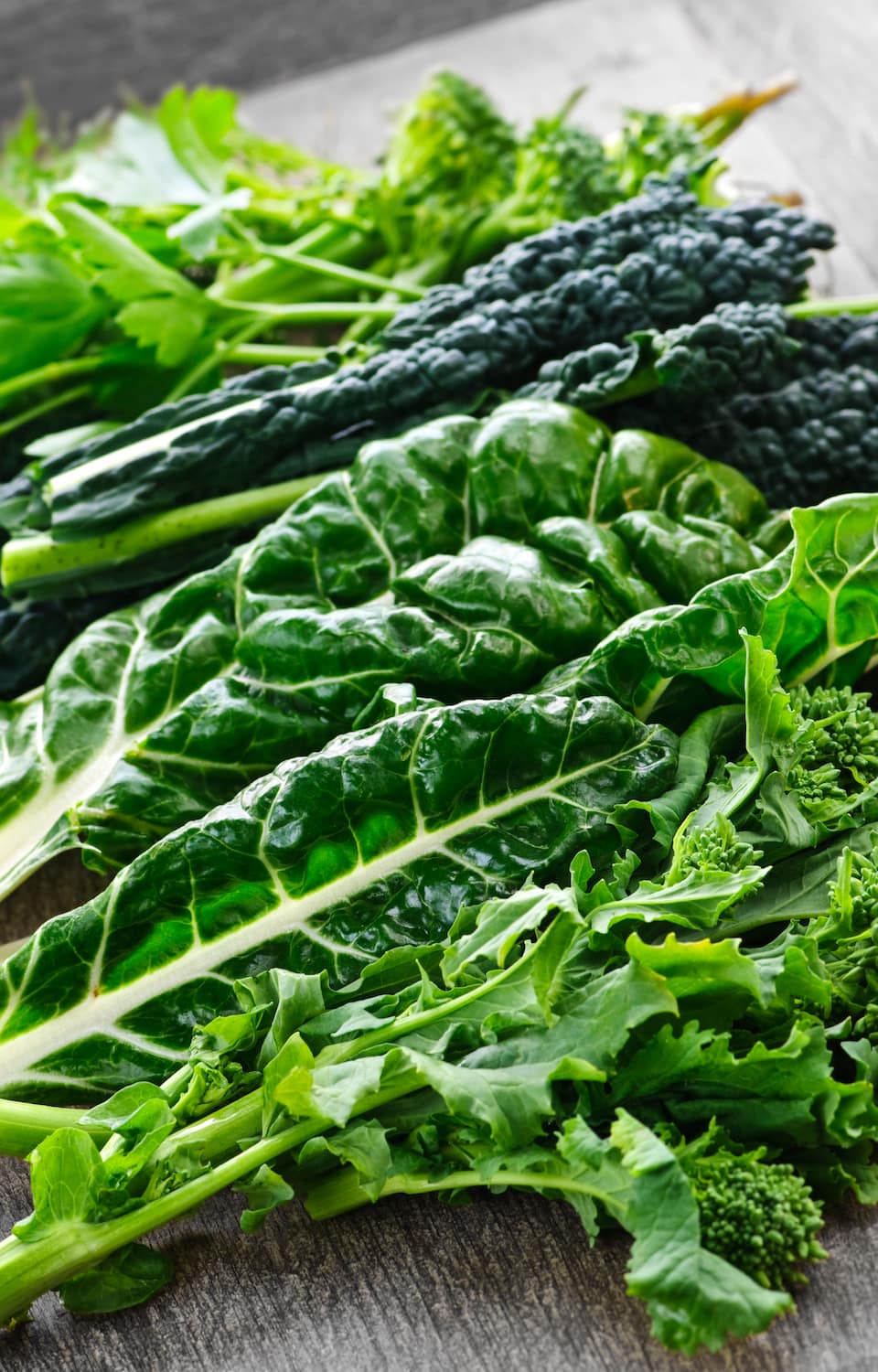 Assorted leafy greens — kale, chard and broccoli rabe